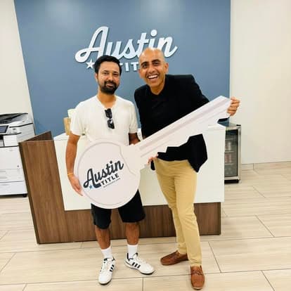 Clients at Austin Title with key