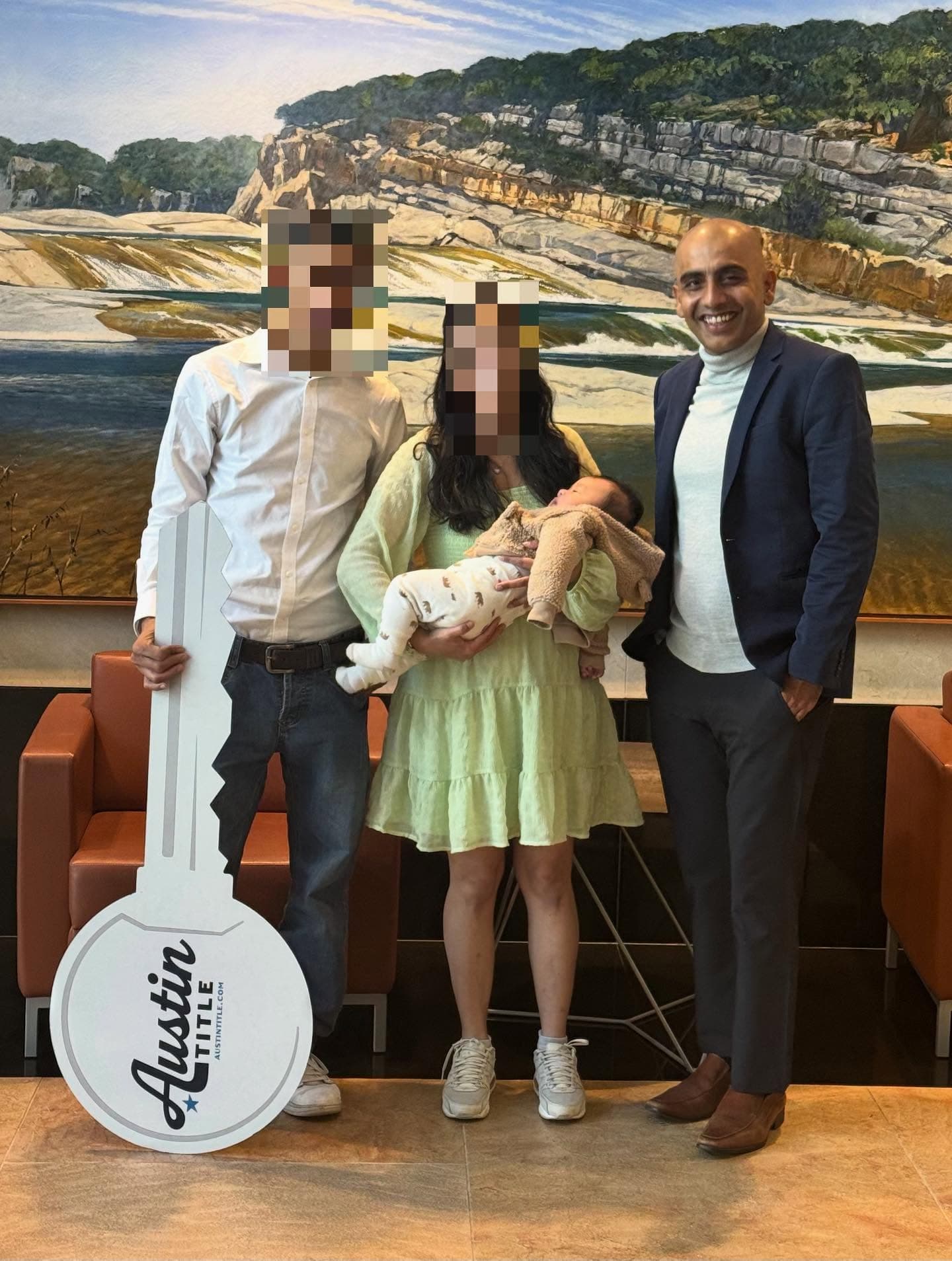 Family with newborn at closing